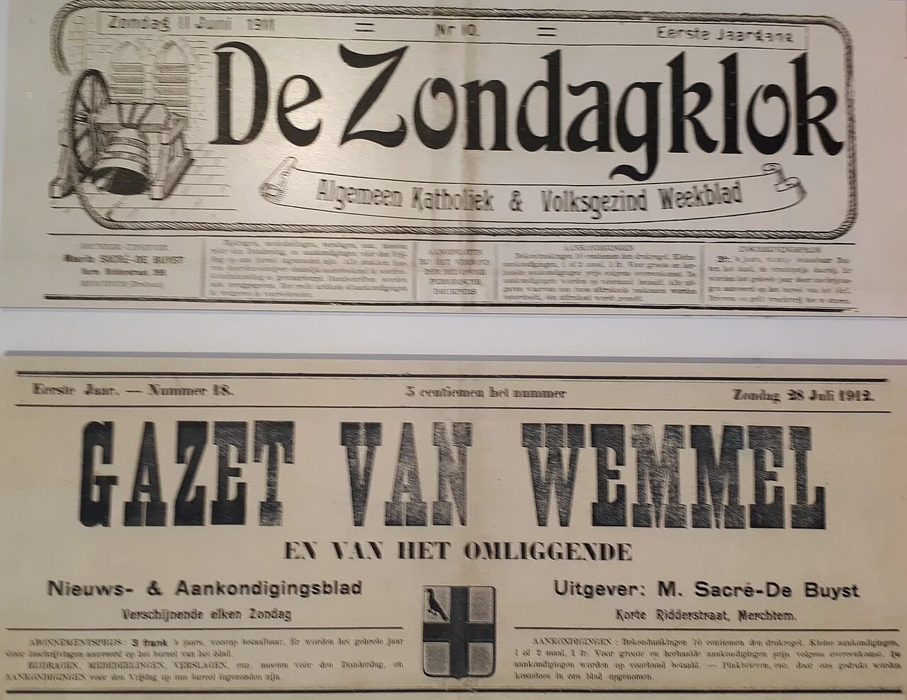A stack of printed newspapers on a publishing desk