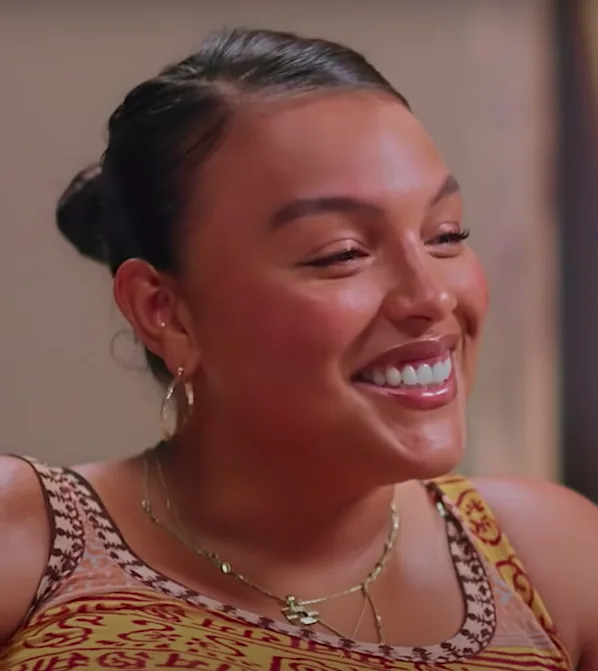 Plus size model appearing in a recorded interview frame