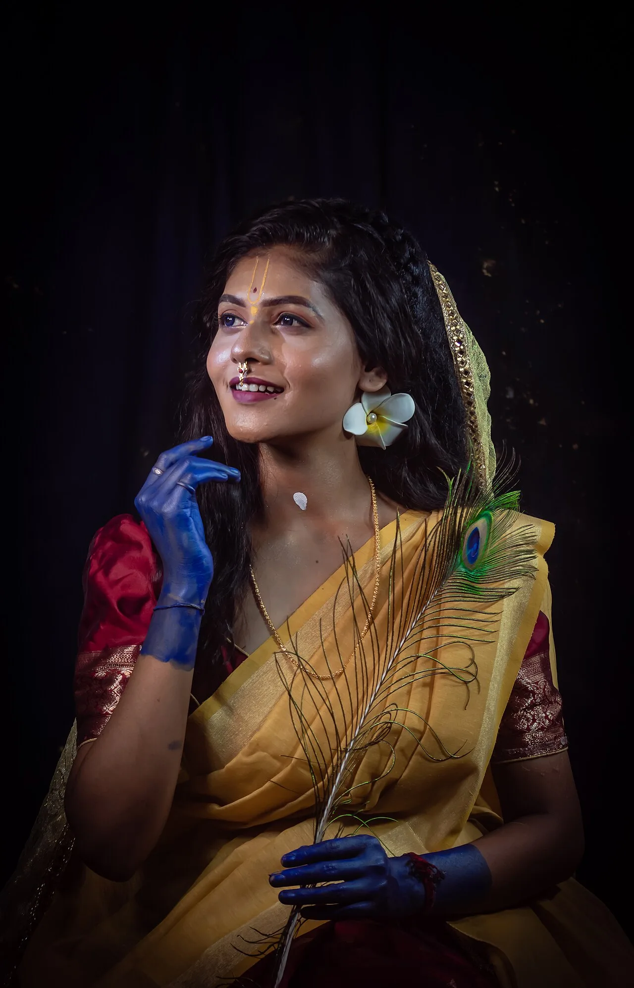 Female dancer performing beneath stage lights